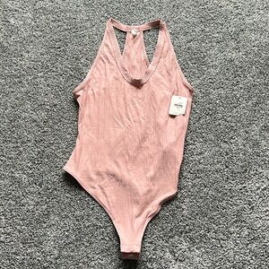 pink free people bodysuit!